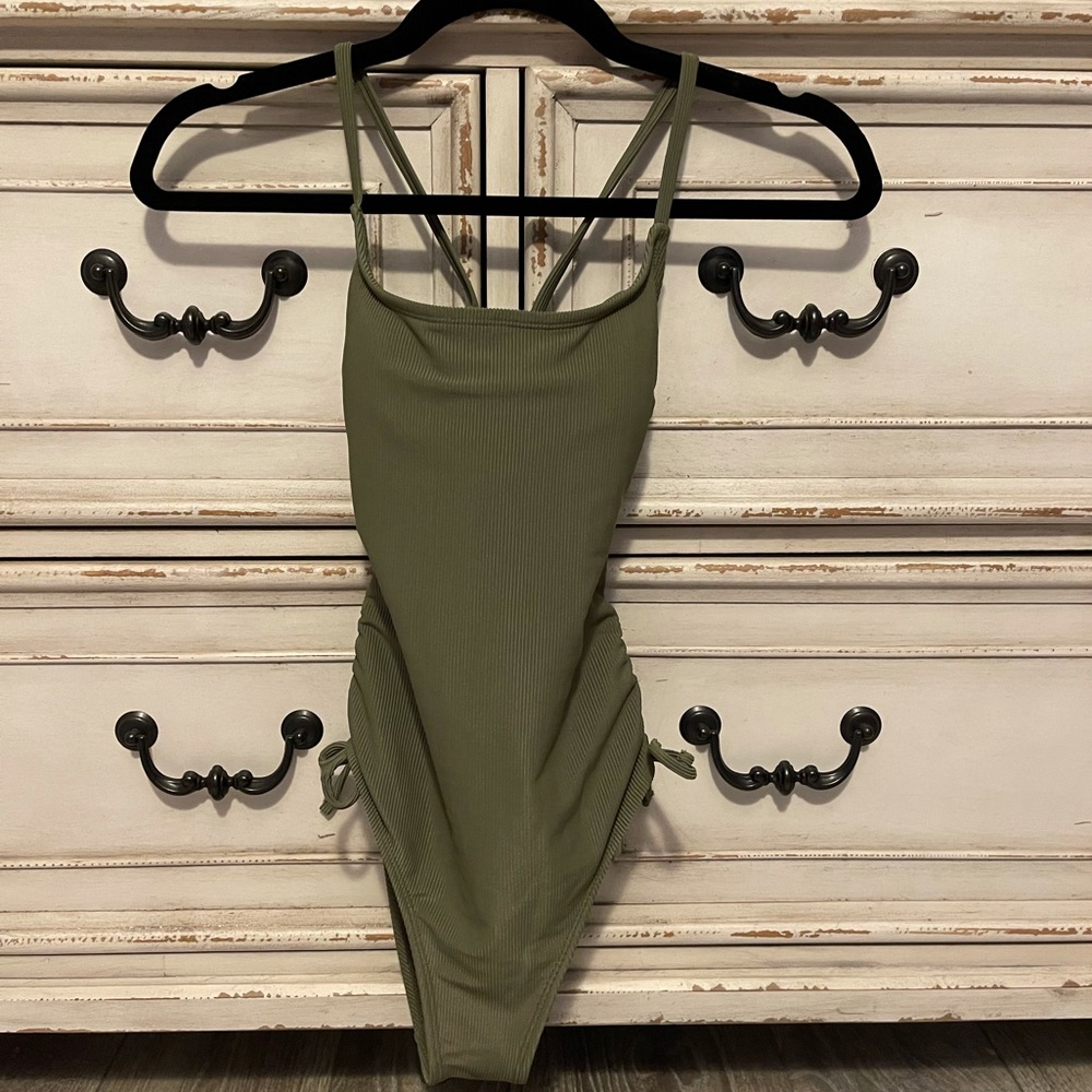 Ribbed, open back swimsuit with ties on sides!